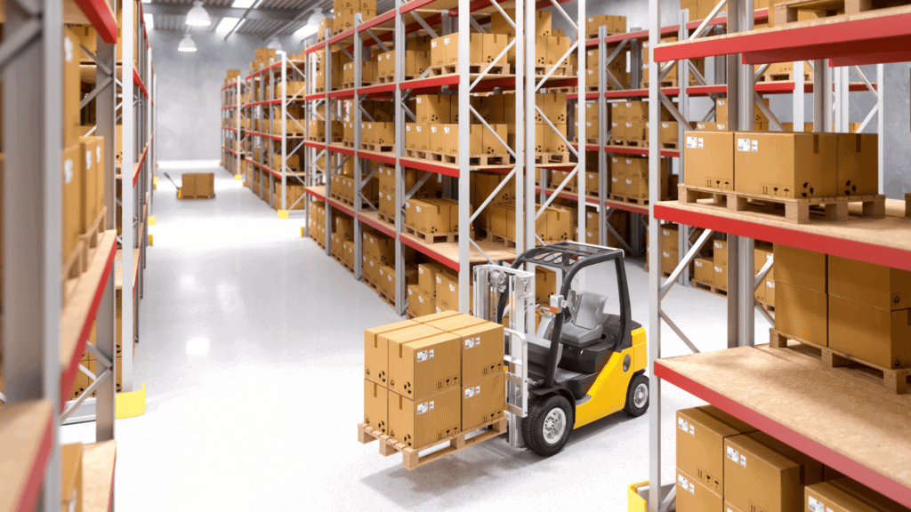 A forklift efficiently moves a pallet of cardboard boxes in a large warehouse, where high metal shelving is stacked with more inventory. The shiny, clean floor speaks to the streamlined operations that contribute to shorter lead times.